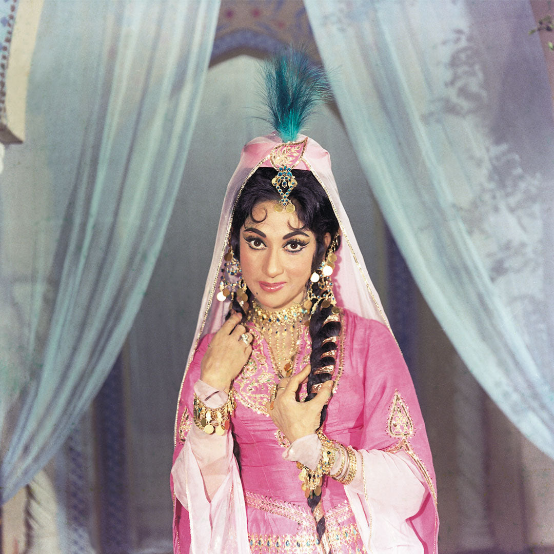 Mala Sinha in a Violet dress with golden jwellery Portrait - still from the movie, “GEET” Personal Bollywood Photography of renowned cinematographer,  Shri Prem Sagar. - Sagar World